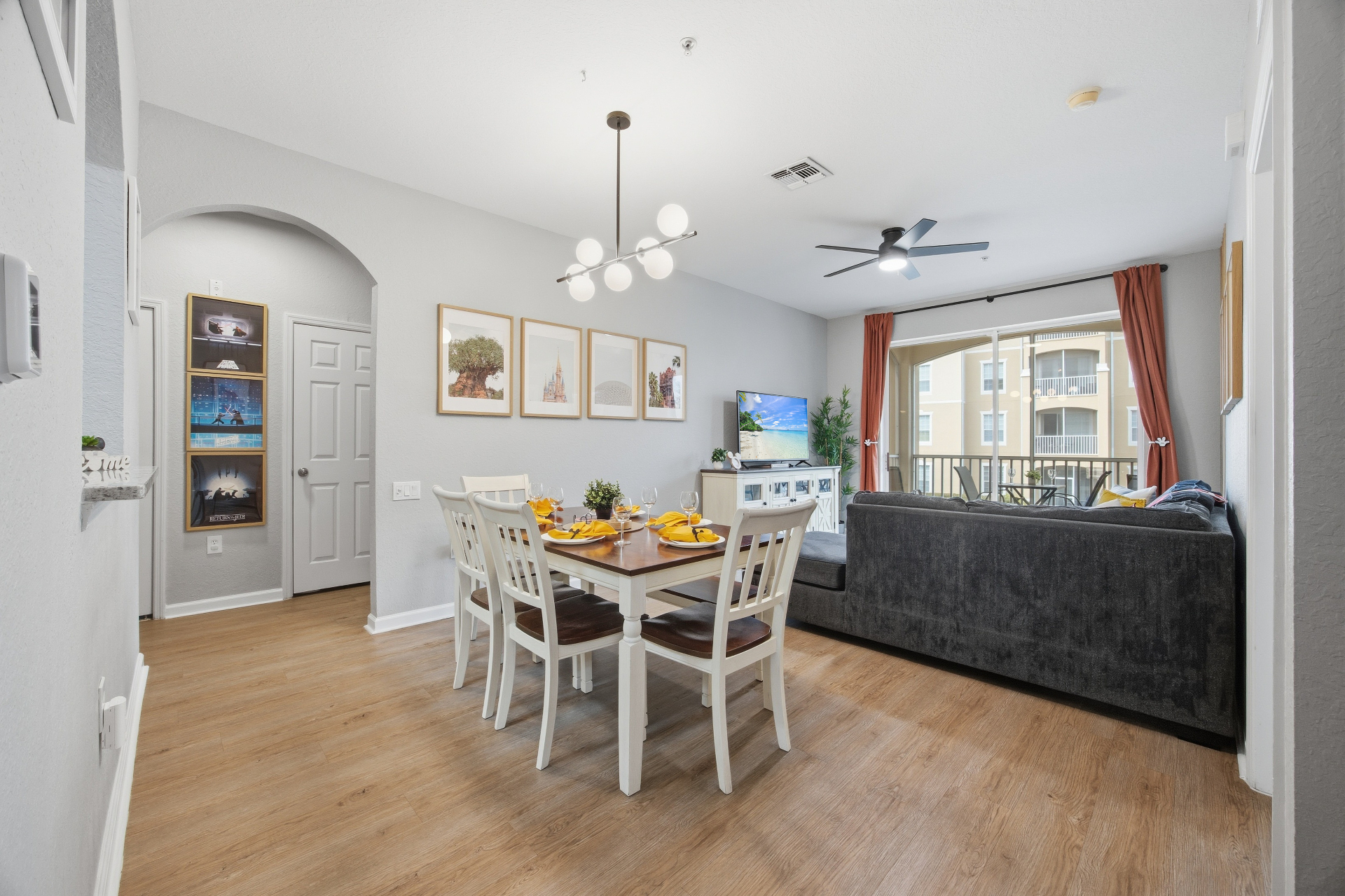 Open dining and living area with balcony view