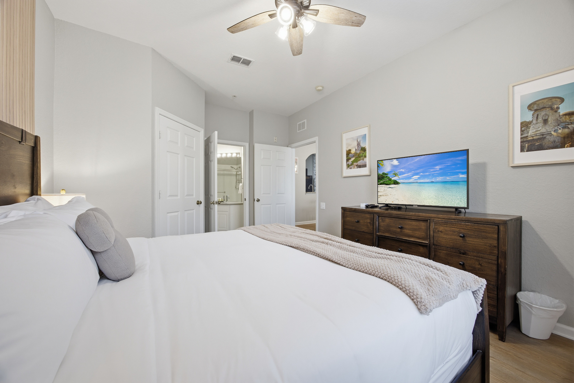 Primary bedroom with TV and en suite access