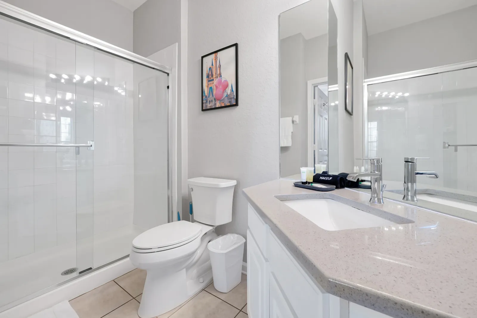 Master bathroom with updated vanity and Mickey wall art