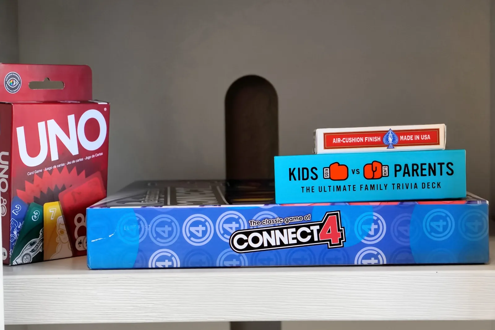 Family board games including Uno, Connect 4, and trivia