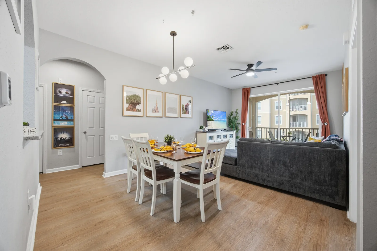 Open dining and living area with balcony view